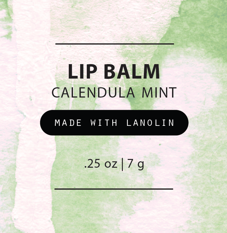 Calendula Mint Lip Balm close up of title on green watercolor